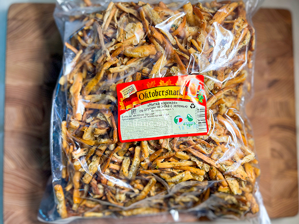 Нитка ЖАРЕНАЯ "Чеснок с зеленью" Oktobersnack 1 кг (сырный продукт) в Климовске